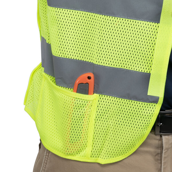 A close up of a yellow Cordova mesh safety vest.