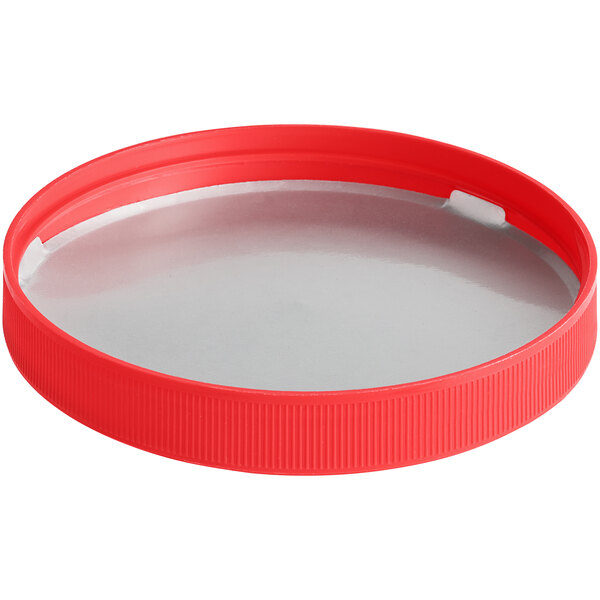 A red plastic lid with a metal rim.