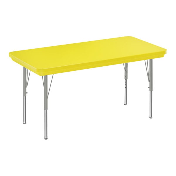 A yellow rectangular Correll activity table with silver legs.