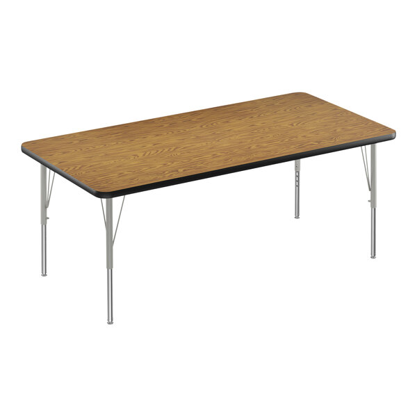 A Correll rectangular table with a medium oak wood top, black edge, and silver legs.