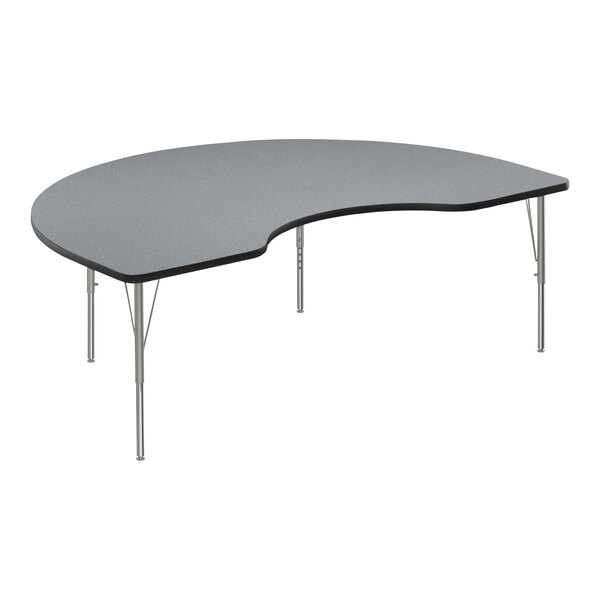 A grey table with a curved black edge.