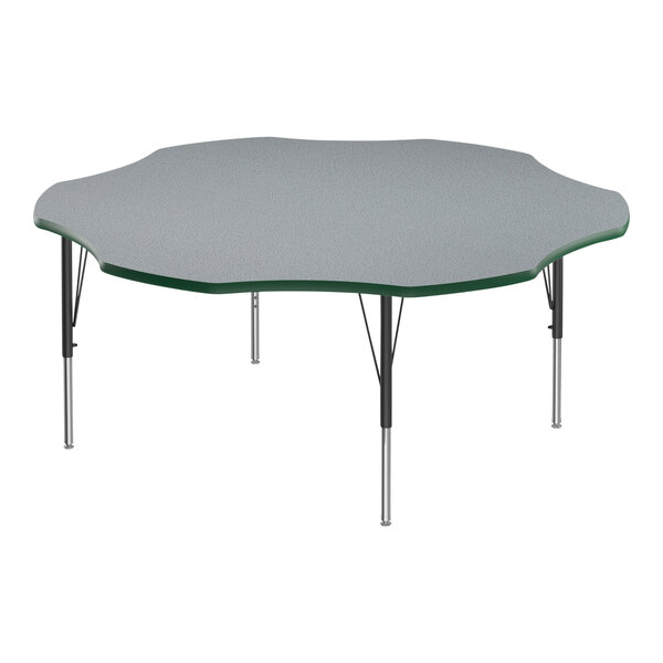 A gray table with a green top.