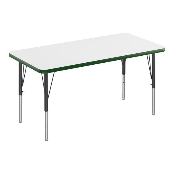 A white rectangular Correll activity table with black legs and green edges.