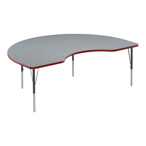 A grey and red curved table with black legs.