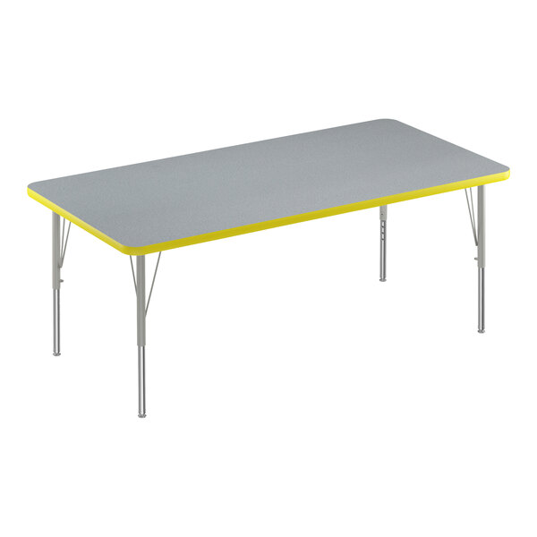 A grey rectangular Correll activity table with yellow edges.