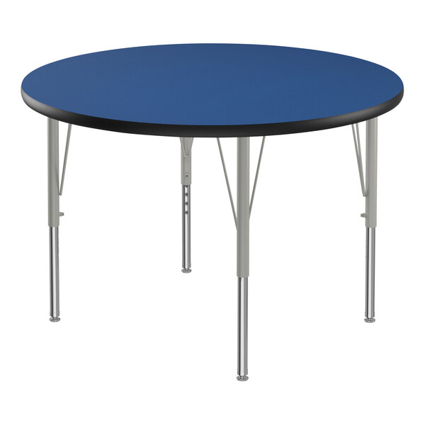 A Correll round activity table with a blue top and silver legs.