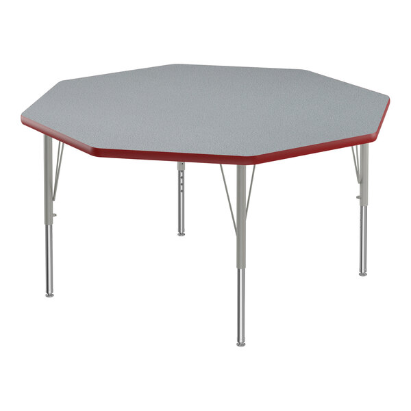 A gray high-pressure laminate octagon activity table with silver legs and red trim.