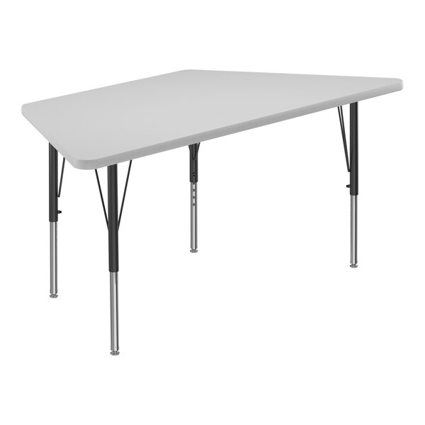 A white trapezoid activity table with black metal legs.