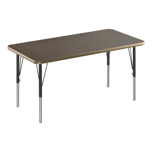 A rectangular walnut activity table with black legs and walnut trim.