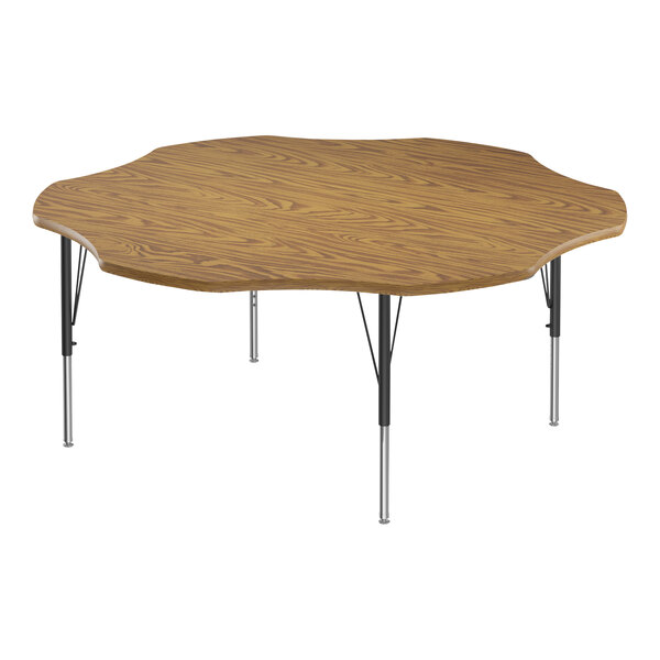 A Correll activity table with a medium oak wood surface and black metal legs.