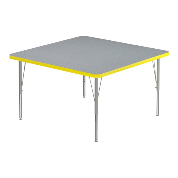 A grey square table with a yellow edge.