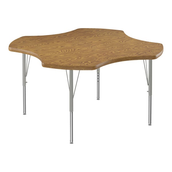 A medium oak activity table with a high-pressure laminate top and metal legs.
