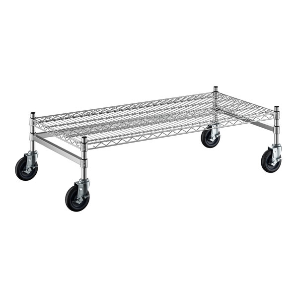 A Regency stainless steel wire dunnage rack with black wheels.