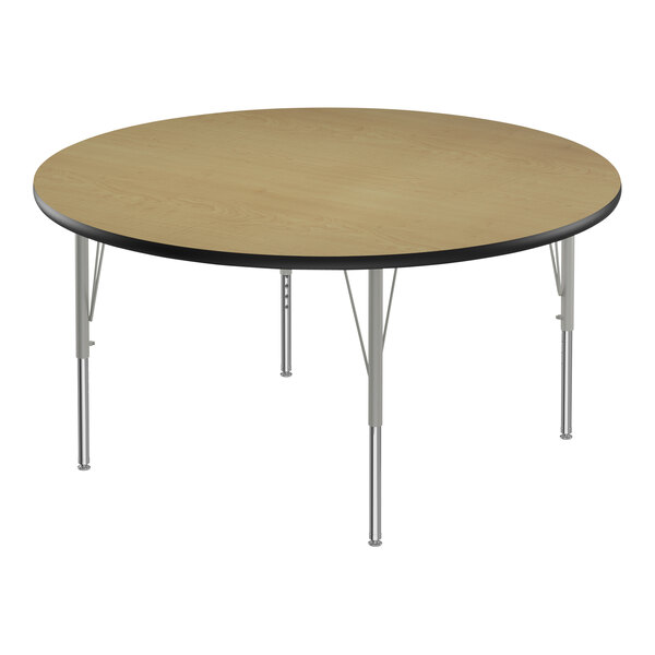 A round Correll activity table with silver metal legs.
