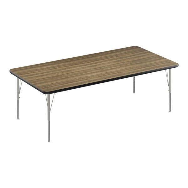 A rectangular Correll activity table with a hickory wood top and silver metal legs.