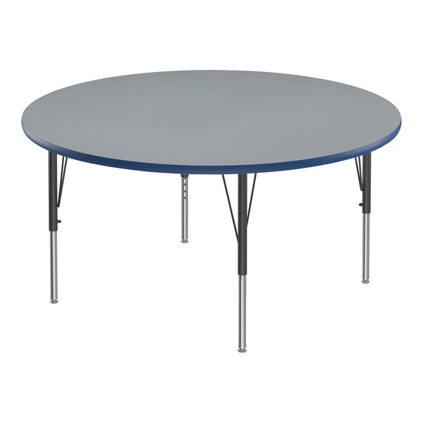 A round Correll activity table with a blue high-pressure laminate top and metal legs.