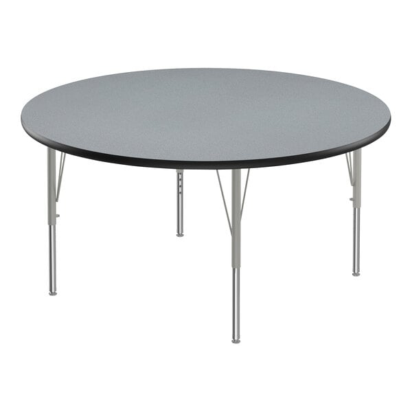 A round table with silver legs.