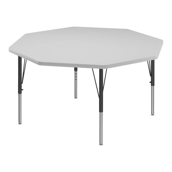 A white octagon activity table with black legs and gray trim.
