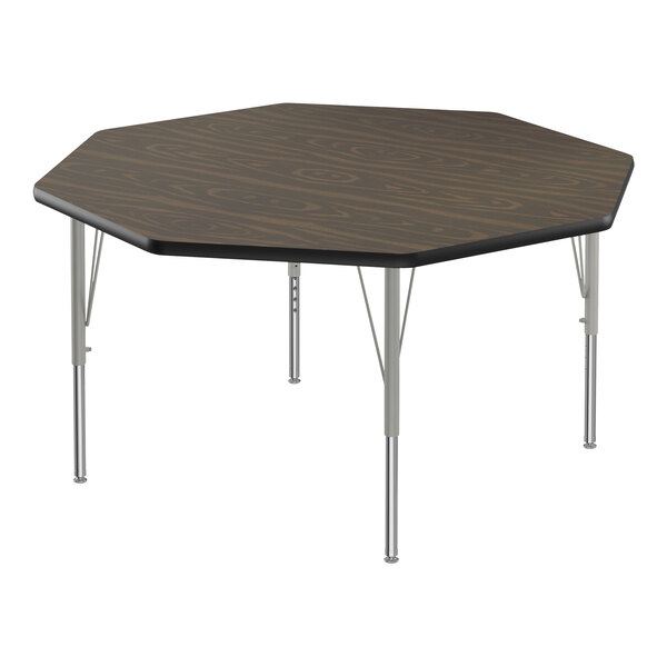 A Correll walnut activity table with metal legs.