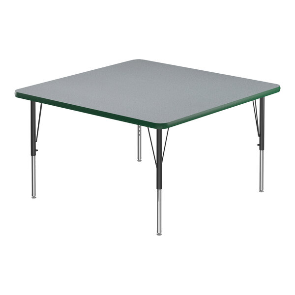 A square gray activity table with black legs and green edge.