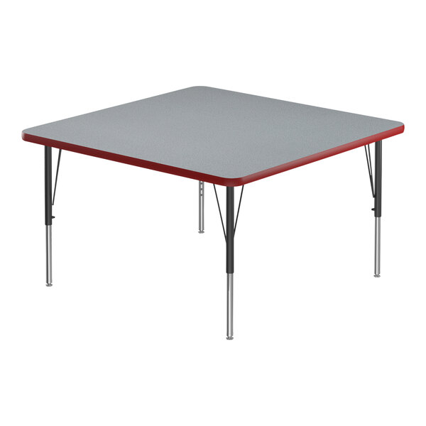 A square gray Correll activity table with red T-mold and metal legs.