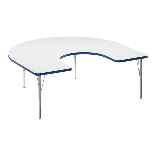 A white Correll horseshoe activity table with a blue edge.