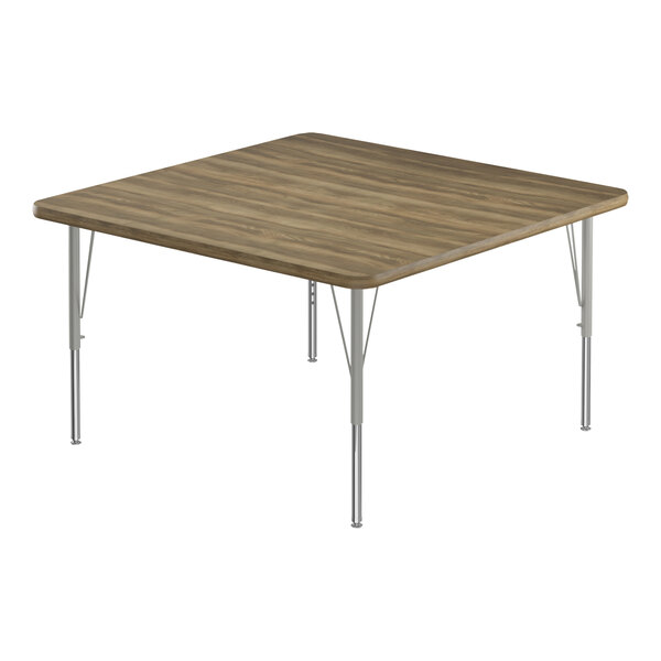 A square table with a hickory high-pressure laminate top and silver legs.