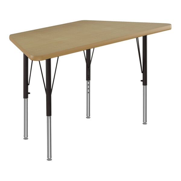 A Correll trapezoid activity table with black legs and a wooden surface.