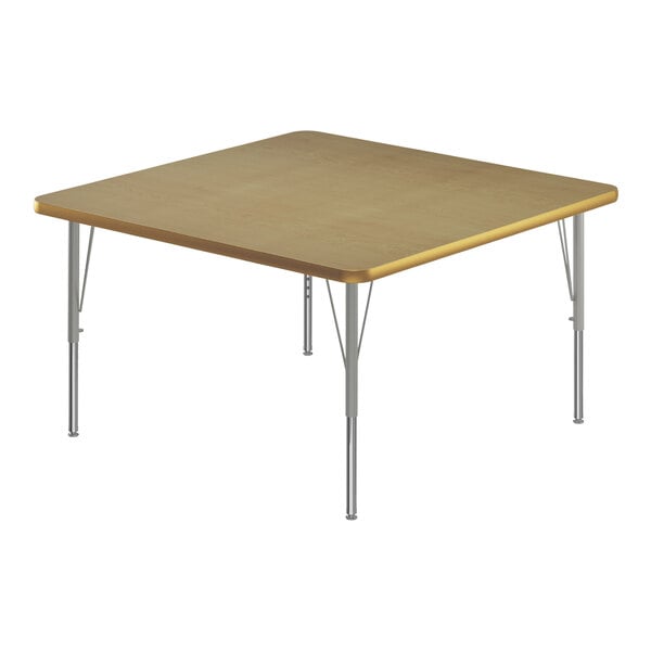 A square Correll activity table with silver metal legs and a fusion maple top.