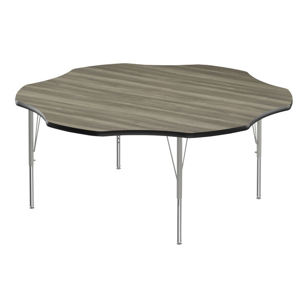 A Correll activity table with a New England driftwood high-pressure laminate top and silver metal legs.