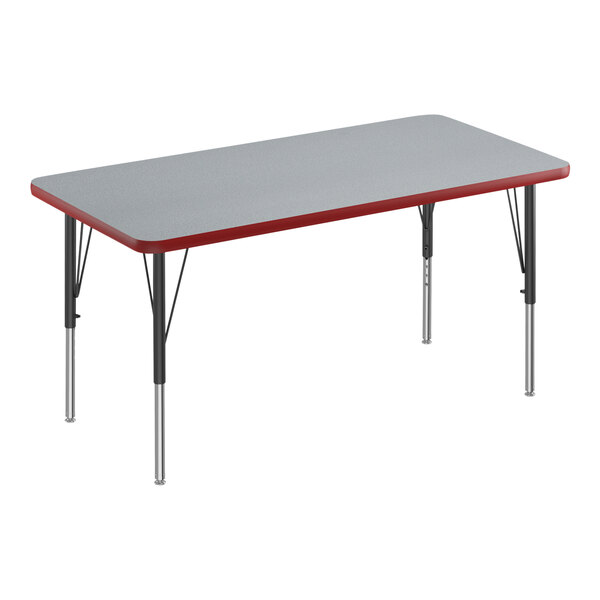 A rectangular grey Correll activity table with black legs and a red edge.