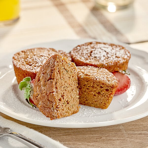 Three Veggies Made Great Cinnamon Roll Muffins on a plate with strawberries.