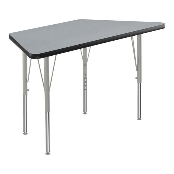 A grey trapezoid-shaped Correll activity table with black and silver details.