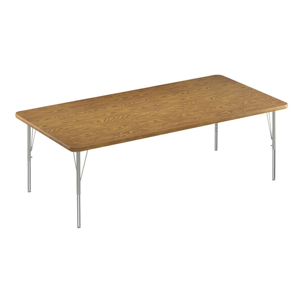 A rectangular wooden table with metal legs.