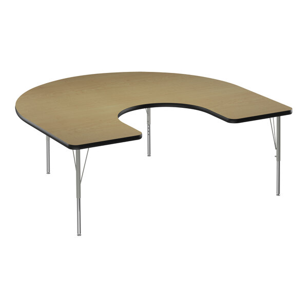 A Correll horseshoe-shaped activity table with silver legs and black trim.