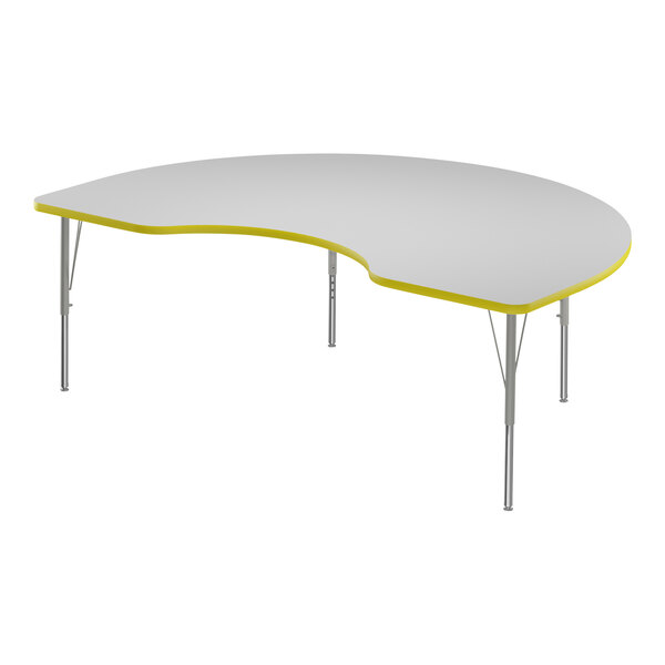 A white Correll activity table with a yellow edge in a curved shape.