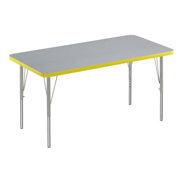 A grey rectangular Correll activity table with yellow edges.