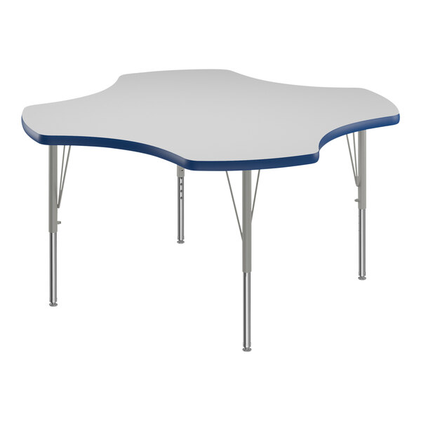 A white and blue table with a star shape and silver legs.