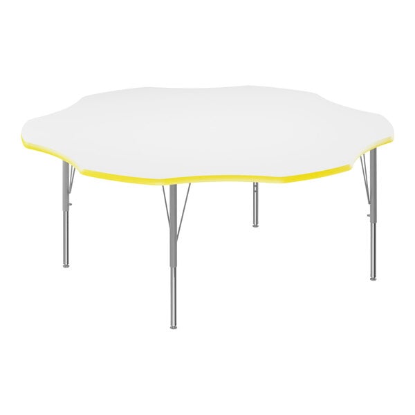 A white Correll activity table with a yellow edge.