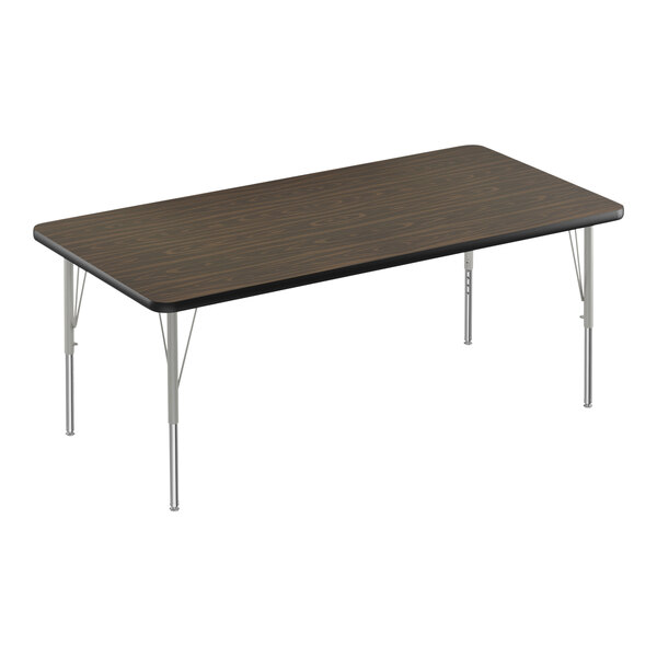 A rectangular table with a walnut top and black border on silver metal legs.