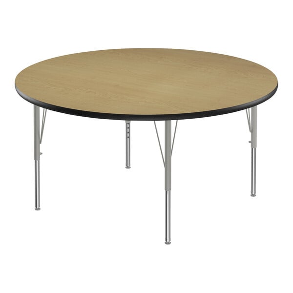 A Correll round activity table with metal legs.