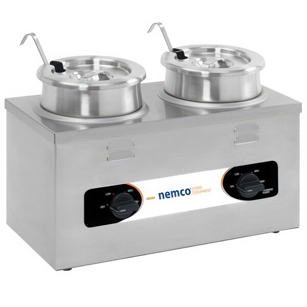 A silver Nemco countertop cooker / warmer with two round pots inside.