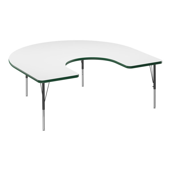 A white Correll horseshoe activity table with a green edge.
