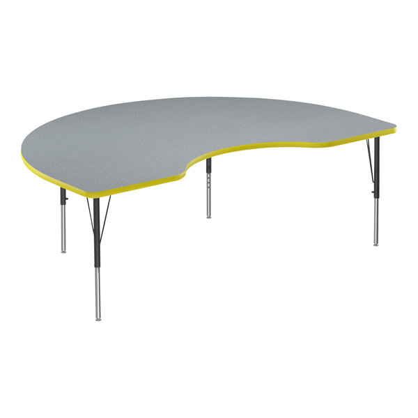 A grey and yellow Correll kidney-shaped activity table.