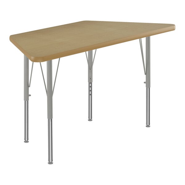 A trapezoid-shaped Correll activity table with silver legs and a wooden top.