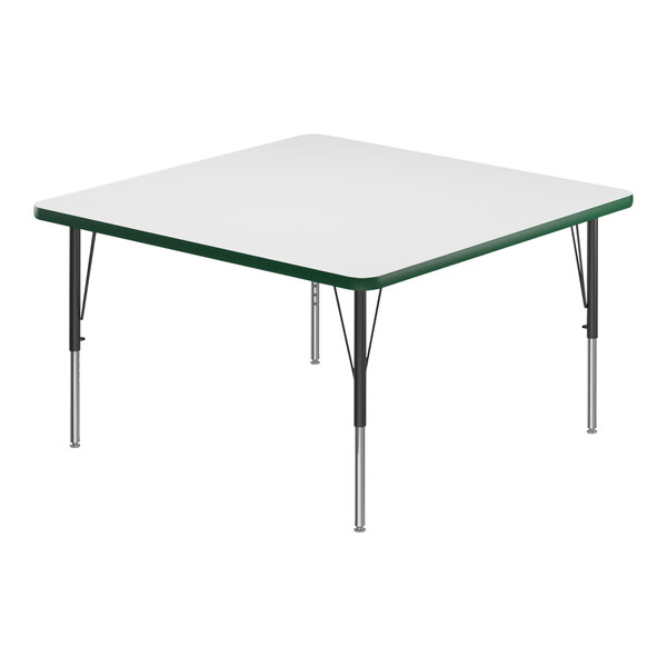 A white square table with a green edge and black legs.