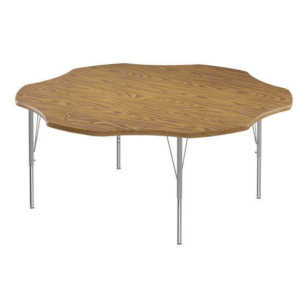 A Correll activity table with a medium oak wood surface and silver legs.