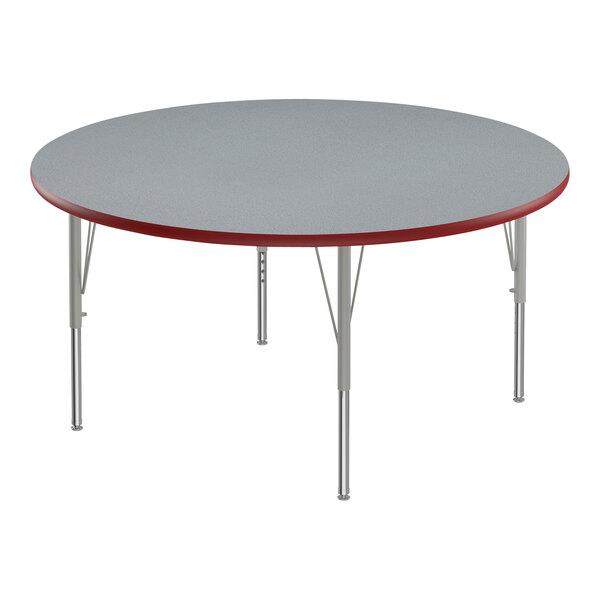 A Correll round gray table with a red edge.