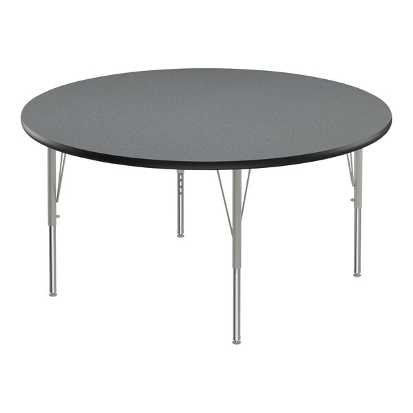 A round Correll activity table with a grey top and black border on silver legs.