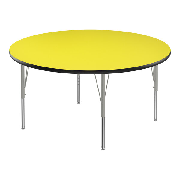 A yellow Correll round activity table with silver legs.